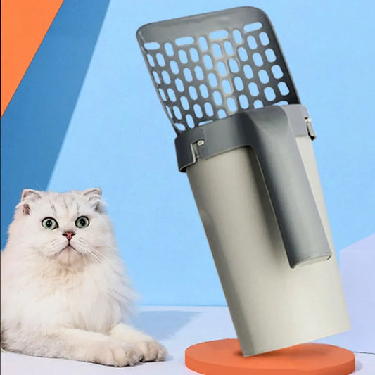 White fluffy cat next to modern gray plastic cat litter scoop and container on colorful background
