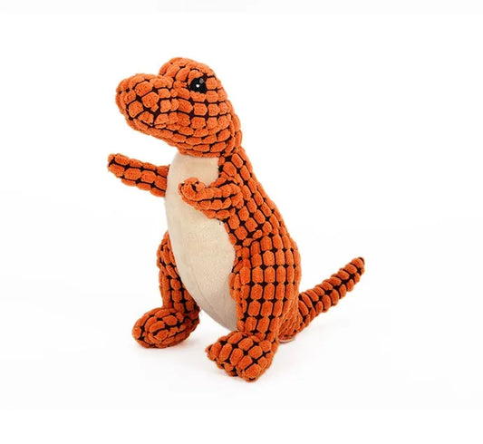 Orange and beige textured dinosaur plush toy with black eyes on white background