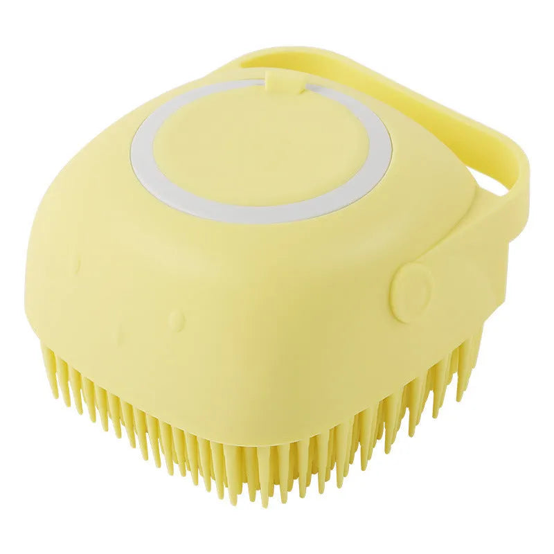 Yellow silicone scalp massager brush with soft flexible bristles and ergonomic handle